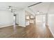 Spacious, open-concept living room with modern flooring and neutral paint at 1764 St Croix Dr, Clearwater, FL 33759