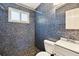 Mosaic tile shower with a black tile floor and modern sink at 1764 St Croix Dr, Clearwater, FL 33759