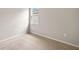 Neutral bedroom featuring carpeted floors and a window to let in natural light at 17800 Solstice Ave, Venice, FL 34293