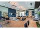 Spacious clubhouse interior featuring stylish seating, modern lighting, and a welcoming atmosphere at 17800 Solstice Ave, Venice, FL 34293