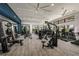 Well-equipped fitness center with modern exercise equipment, natural light, and ample space at 17800 Solstice Ave, Venice, FL 34293
