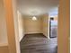 Open dining area with hardwood floors and modern lighting at 18267 Bridle Club Dr, Tampa, FL 33647