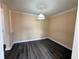 A simple dining room area featuring overhead lighting and modern floors at 18267 Bridle Club Dr, Tampa, FL 33647