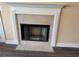 A traditional fireplace with tiled surround and hearth adds a cozy ambiance at 18267 Bridle Club Dr, Tampa, FL 33647