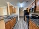 Well-equipped kitchen featuring stainless steel appliances and granite countertops at 18267 Bridle Club Dr, Tampa, FL 33647