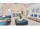 Open-concept design with the living room and kitchen featuring modern decor and lots of natural light at 18636 Sailors Delight Pass, Land O Lakes, FL 34638