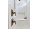Close-up of a new tiled shower stall with a built in bench and bronze shower hardware at 18636 Sailors Delight Pass, Land O Lakes, FL 34638