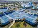 Aerial view of the community tennis and pickleball courts surrounded by landscaping at 18636 Sailors Delight Pass, Land O Lakes, FL 34638