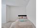 Cozy bedroom with a comfortable bed and neutral decor at 1967 Hovenweep Rd, Wesley Chapel, FL 33543