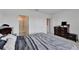 Spacious bedroom layout with view of bathroom and walk-in closet for maximal storage at 1967 Hovenweep Rd, Wesley Chapel, FL 33543