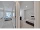 Hallway with views of bedrooms and neutral decor at 1967 Hovenweep Rd, Wesley Chapel, FL 33543