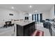 Open floorplan with dining, kitchen and living room at 1967 Hovenweep Rd, Wesley Chapel, FL 33543