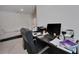 Bright home office featuring computer desk and lots of table space at 1967 Hovenweep Rd, Wesley Chapel, FL 33543