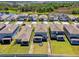 Aerial view of a neighborhood featuring fenced backyards at 22287 Storybook Cabin Way, Land O Lakes, FL 34637
