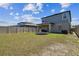 Fenced backyard with a patio and trampoline at 22287 Storybook Cabin Way, Land O Lakes, FL 34637