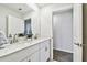 Bright bathroom with a double sink vanity, quartz countertop and tiled floors at 22287 Storybook Cabin Way, Land O Lakes, FL 34637