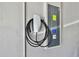 A Tesla charger installed on the wall in the garage at 22287 Storybook Cabin Way, Land O Lakes, FL 34637