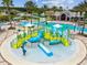 The wonderful Connerton community water park featuring slides, water features and a pool at 22287 Storybook Cabin Way, Land O Lakes, FL 34637