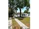 Well-maintained single-story home with paver driveway and lovely yard at 2315 Carroll Pl, Tampa, FL 33612