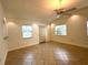 Bright living room featuring recessed lighting, ceiling fan, and tiled floors at 2315 Carroll Pl, Tampa, FL 33612