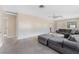 Open living area showing terrazzo floors, neutral wall paint, and plenty of natural light at 2418 N Links Ave, Sarasota, FL 34234