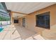 Covered patio overlooking the screened-in pool and backyard at 2974 Sean Way, Palm Harbor, FL 34684