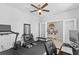 Bright bonus room provides a versatile space for a home office and fitness, enhanced by natural light and modern amenities at 33645 Elm Hill Br, Wesley Chapel, FL 33545