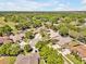 Residential neighborhood showcasing lush green trees, well-maintained homes and serene surroundings at 4419 Swift Cir, Valrico, FL 33596