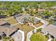 Sprawling property featuring a screened-in pool, meticulously landscaped grounds, and a circular driveway at 4419 Swift Cir, Valrico, FL 33596