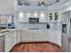 This updated kitchen features stainless appliances and stone countertops at 4419 Swift Cir, Valrico, FL 33596