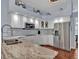 Updated kitchen with stainless appliances and granite countertops at 4419 Swift Cir, Valrico, FL 33596