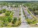 Aerial view of a neighborhood showcasing a gated entrance and manicured landscaping at 5946 81St N Ave, Pinellas Park, FL 33781