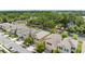 Scenic aerial view of neighborhood homes with lush landscaping and a green backdrop at 5946 81St N Ave, Pinellas Park, FL 33781