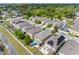 Overhead view of a residential area, showing homes with solar panels and backyard amenities at 5946 81St N Ave, Pinellas Park, FL 33781