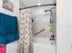 Cozy bathroom featuring a tub, a showerhead, and a shower curtain for a relaxing bathing experience at 5946 81St N Ave, Pinellas Park, FL 33781