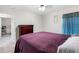 Inviting bedroom with a cozy bed, a window, and a chest of drawers providing ample storage at 5946 81St N Ave, Pinellas Park, FL 33781