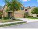 Inviting two-story home with a well-manicured lawn and a two-car garage, perfect for Gathering living at 5946 81St N Ave, Pinellas Park, FL 33781
