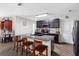 Spacious kitchen island with counter seating and modern appliances, perfect for cooking and entertaining at 5946 81St N Ave, Pinellas Park, FL 33781
