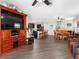 Open concept living area with kitchen, dining space, and living room for easy entertainment at 5946 81St N Ave, Pinellas Park, FL 33781