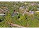Aerial photograph of community highlighting the density of trees and greenery in the area at 7169 Spruce Dr, Weeki Wachee, FL 34607