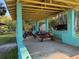 Covered picnic area with multiple tables, perfect for community gatherings and outdoor dining experiences at 7169 Spruce Dr, Weeki Wachee, FL 34607
