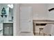 Nicely decorated bathroom featuring a granite vanity and nautical themed decorations at 7215 Wash Island Dr, Sun City Center, FL 33573