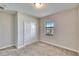 Standard bedroom featuring a double-door closet and window providing natural light at 7215 Wash Island Dr, Sun City Center, FL 33573