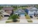 Charming single-Gathering home featuring a two-car garage, manicured landscaping, and a welcoming entrance at 7215 Wash Island Dr, Sun City Center, FL 33573