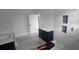 Bathroom with a modern vanity, elegant marble shower, and patterned tile flooring at 745 31St N Ave, St Petersburg, FL 33704