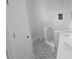 Bathroom with a new vanity, shower with marble tile, and patterned flooring at 745 31St N Ave, St Petersburg, FL 33704