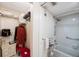 Bathroom includes a shower, tub and walk-in closet with shelving and drawers at 7700 92Nd St # 207, Seminole, FL 33777