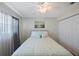Cozy bedroom with double door closet and ceiling fan at 7700 92Nd St # 207, Seminole, FL 33777