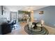 Comfortable living and dining area with breakfast bar and an adjacent computer desk at 7700 92Nd St # 207, Seminole, FL 33777