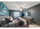 Spacious main bedroom with ceiling fan and coordinating furniture at 7700 92Nd St # 207, Seminole, FL 33777